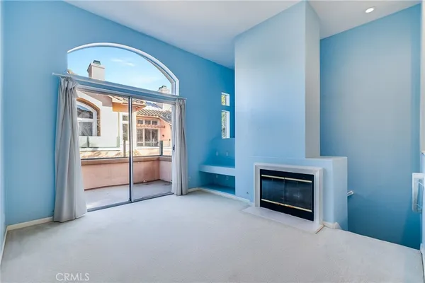 a kitchen with a sink stove top oven and refrigerator