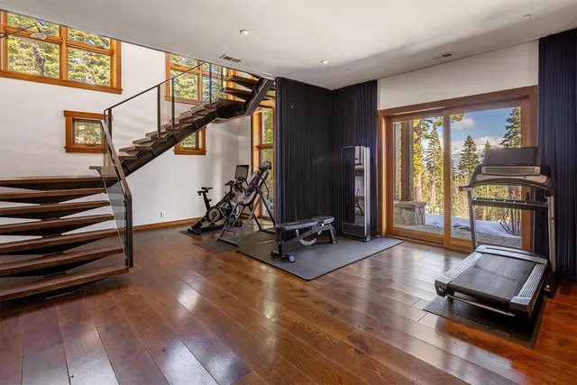 a view of a dining room with furniture window and wooden floor