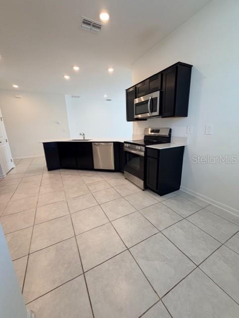 352 Kayden Cove Lake Wales, FL 33859 - Photo 20 of 32 a view of kitchen with microwave and cabinets