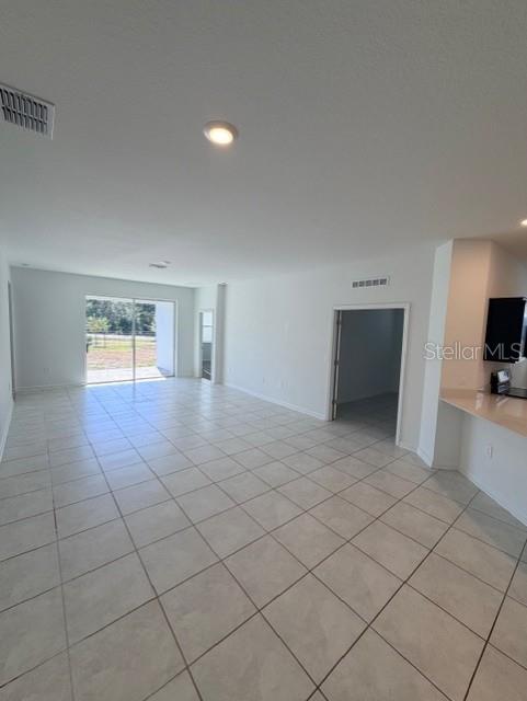 352 Kayden Cove Lake Wales, FL 33859 - Photo 22 of 32 a view of empty room with wooden floor