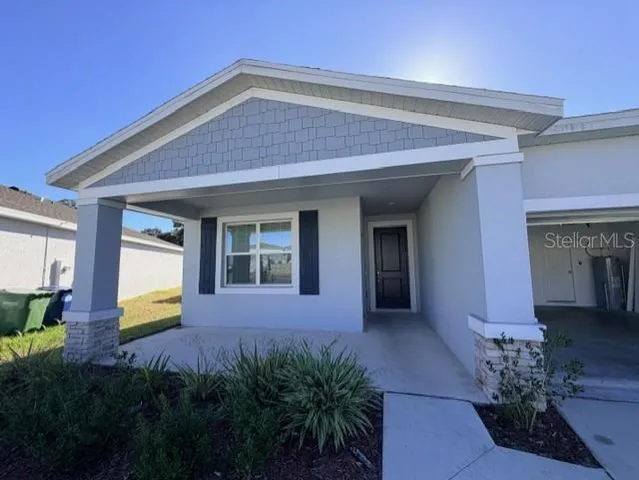 a house view with a garden space
