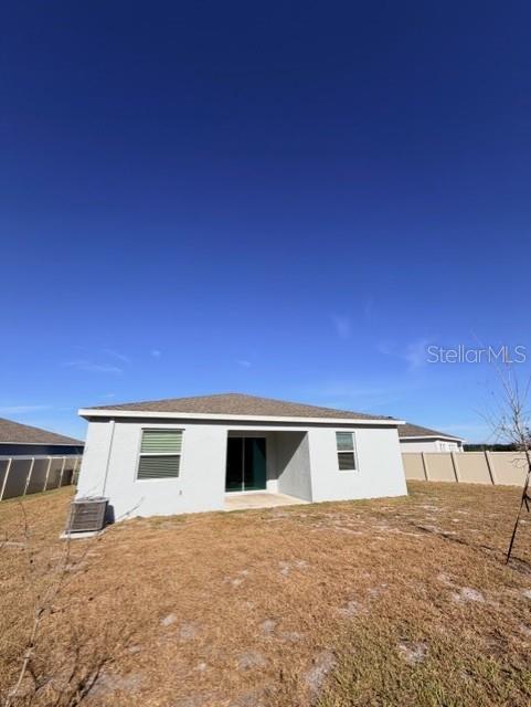 352 Kayden Cove Lake Wales, FL 33859 - Photo 5 of 32 a view of a house with a yard