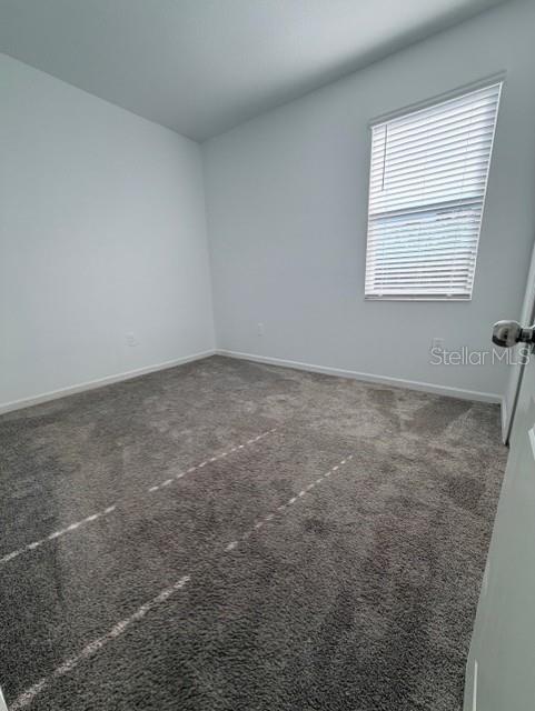 352 Kayden Cove Lake Wales, FL 33859 - Photo 10 of 32 an empty room with windows