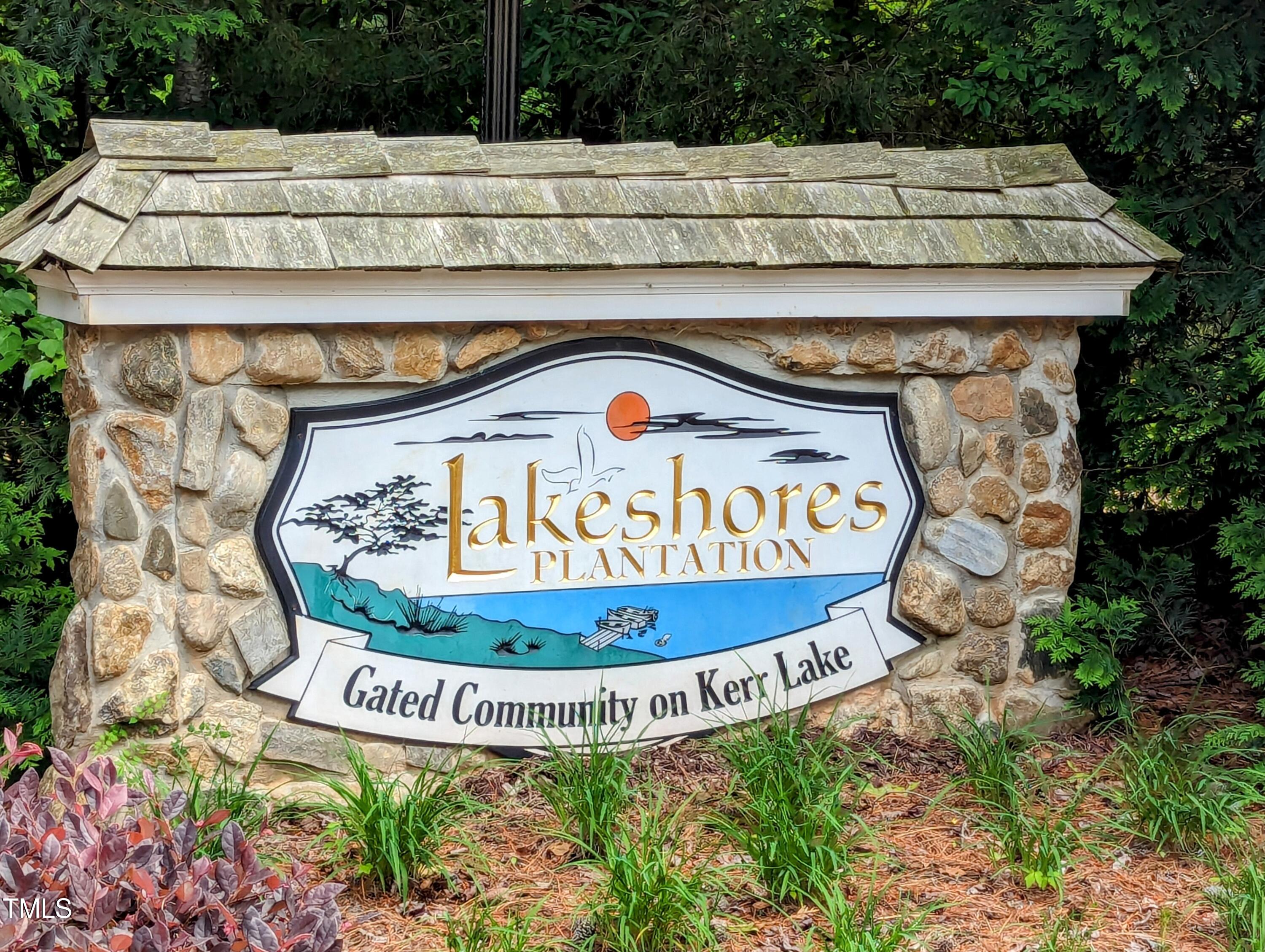 271 Buoy Drive Henderson, NC 27537 - Photo 3 of 21 a view of outdoor space with signage and flags