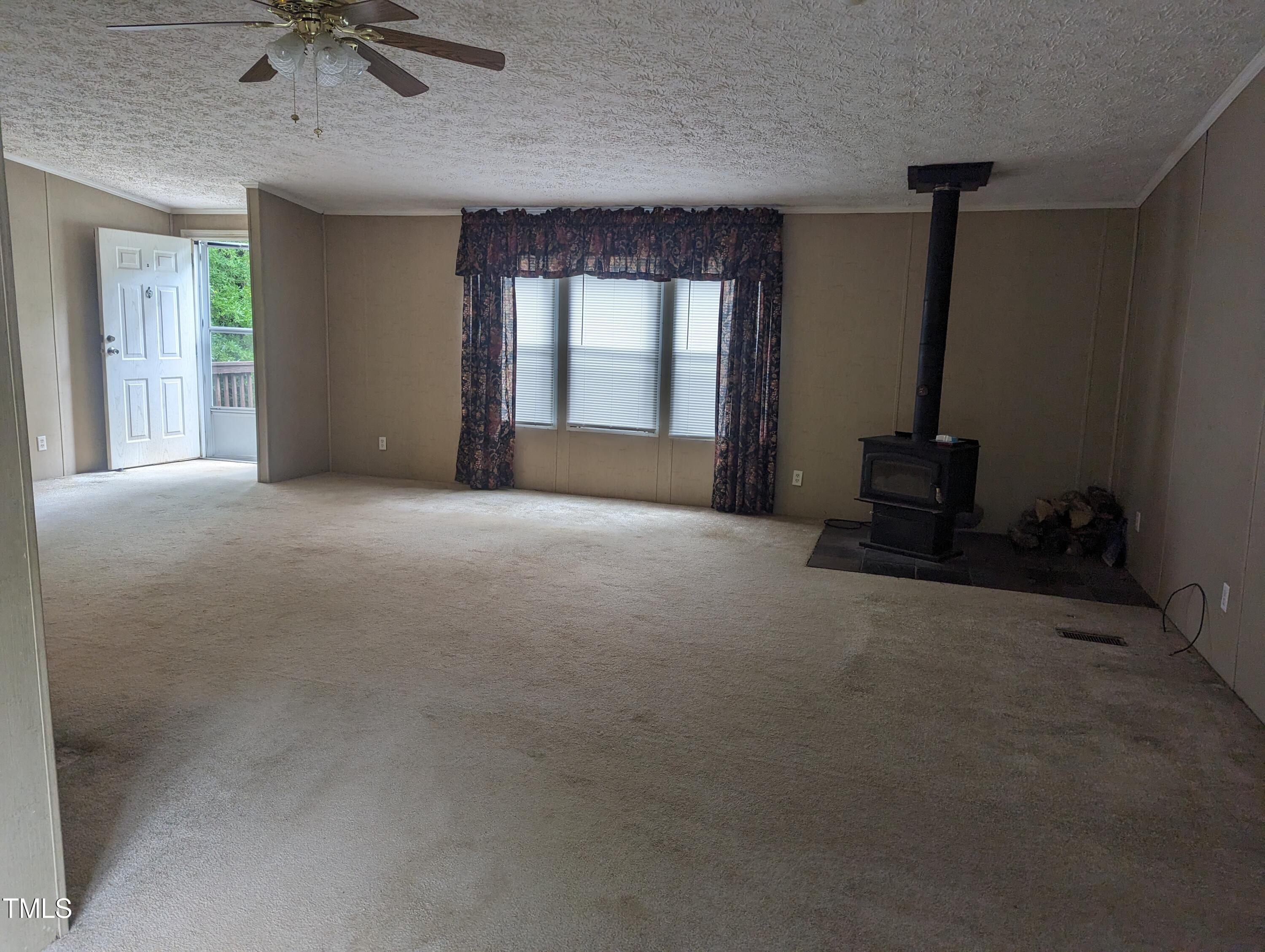 271 Buoy Drive Henderson, NC 27537 - Photo 6 of 21 a view of an empty room with a window