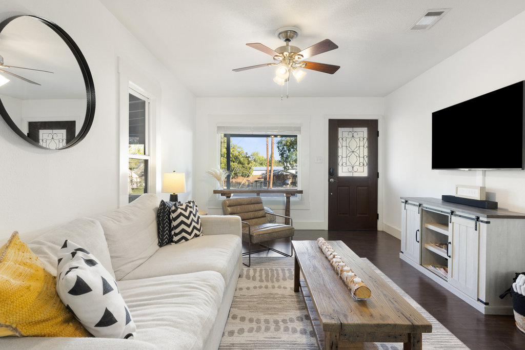 102 Ranchview Drive Johnson City, TX 78636 - Photo 11 of 37 a living room with furniture and a flat screen tv