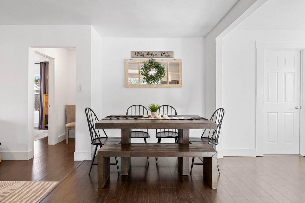 102 Ranchview Drive Johnson City, TX 78636 - Photo 15 of 37 a view of a dining room with furniture and wooden floor