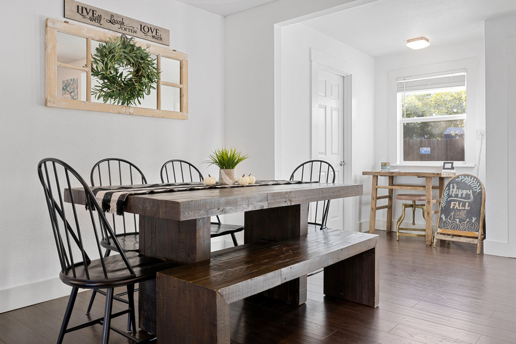 102 Ranchview Drive Johnson City, TX 78636 - Photo 17 of 37 a view of a dining room with furniture window and wooden floor