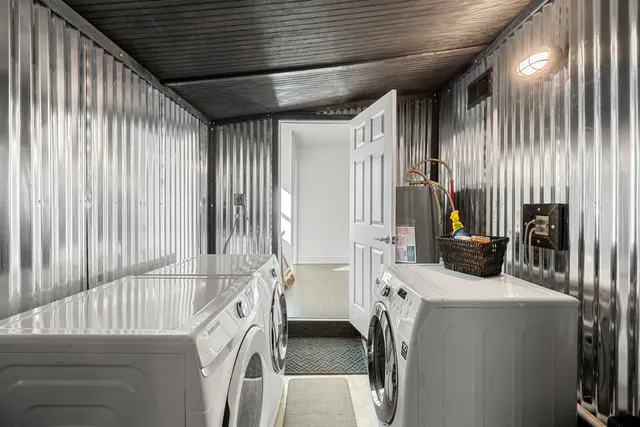 a view of backyard with furniture and a garden