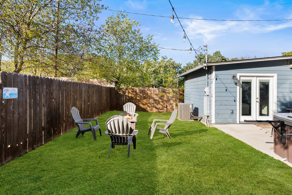 102 Ranchview Drive Johnson City, TX 78636 - Photo 36 of 37 a view of a chair and table in backyard of the house