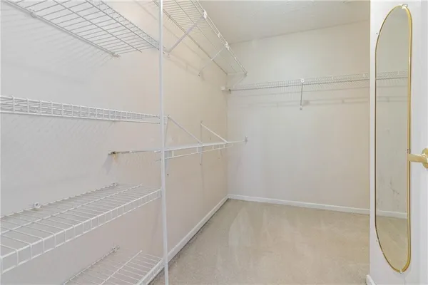 a view of a room with racks on the wall