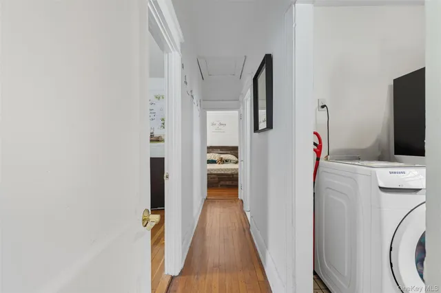 a view of a kitchen from the hallway