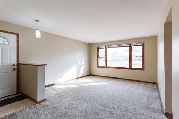 an empty room with windows