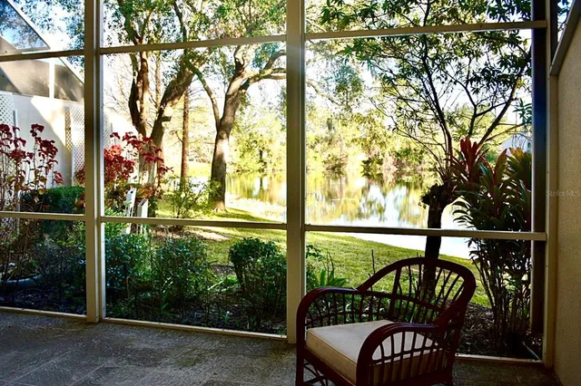 a white refrigerator freezer and a stove sitting inside of a kitchen
