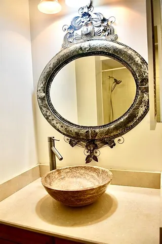 a bathroom with a bathtub and shower