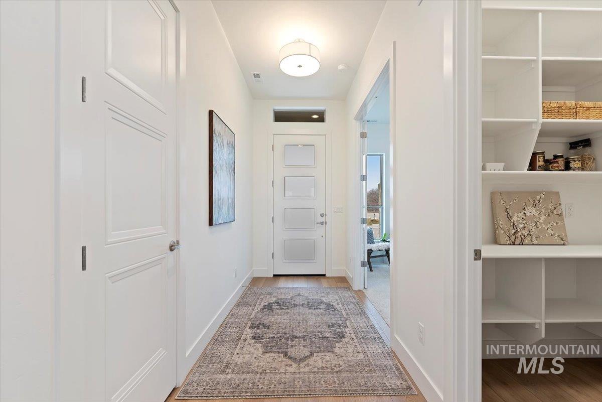 1297 Chena Street Middleton, ID 83644 - Photo 6 of 38 Doorway with baseboards and wood finished floors