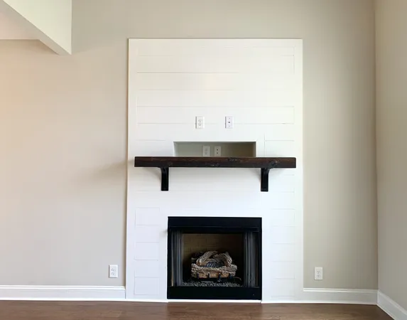 a close view of a fireplace in a room