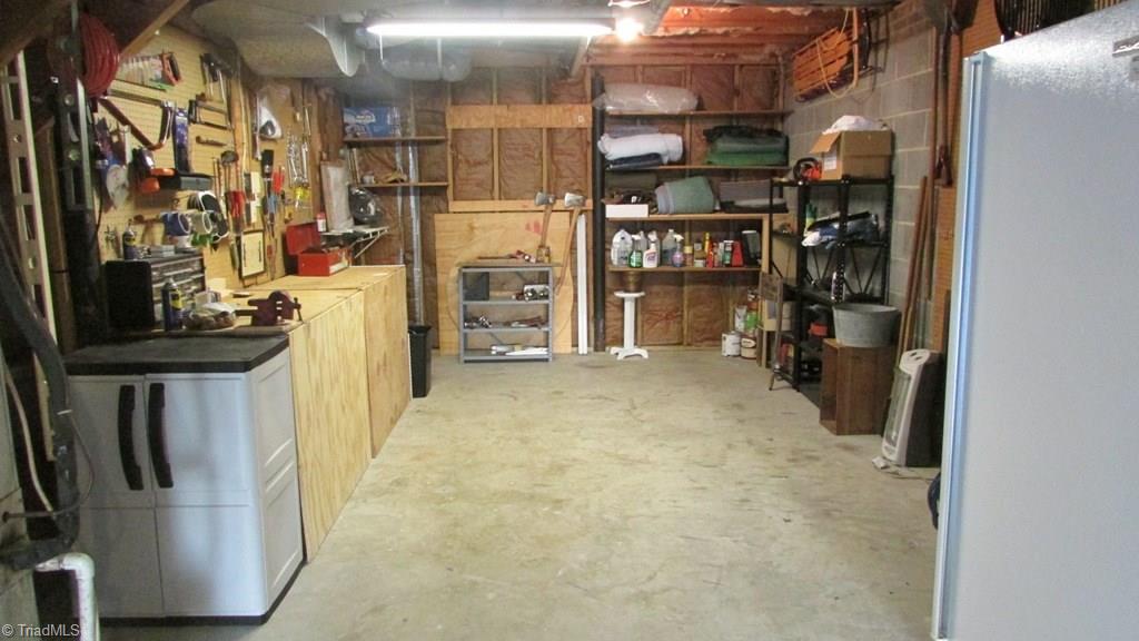 3821 Sandlewood Road High Point, NC 27265 - Photo 28 of 29 Garage workshop could also be used to park a 3rd car!