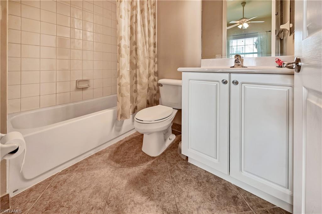 6623 Monterey Point Naples, FL 34105 - Photo 20 of 34 a bathroom with a sink a toilet and shower