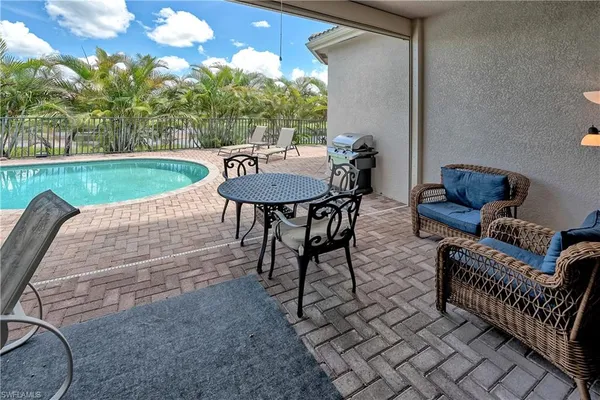 a view of a patio with a yard