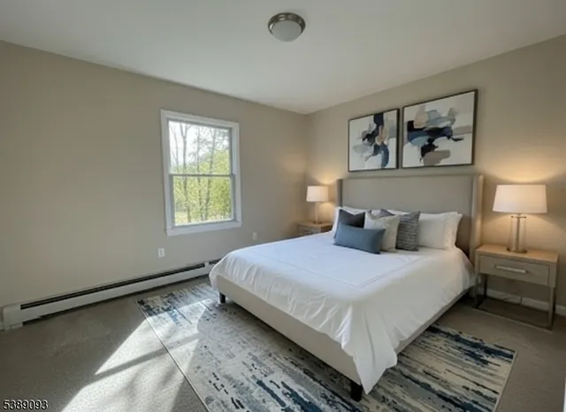 a bedroom with bed and a window