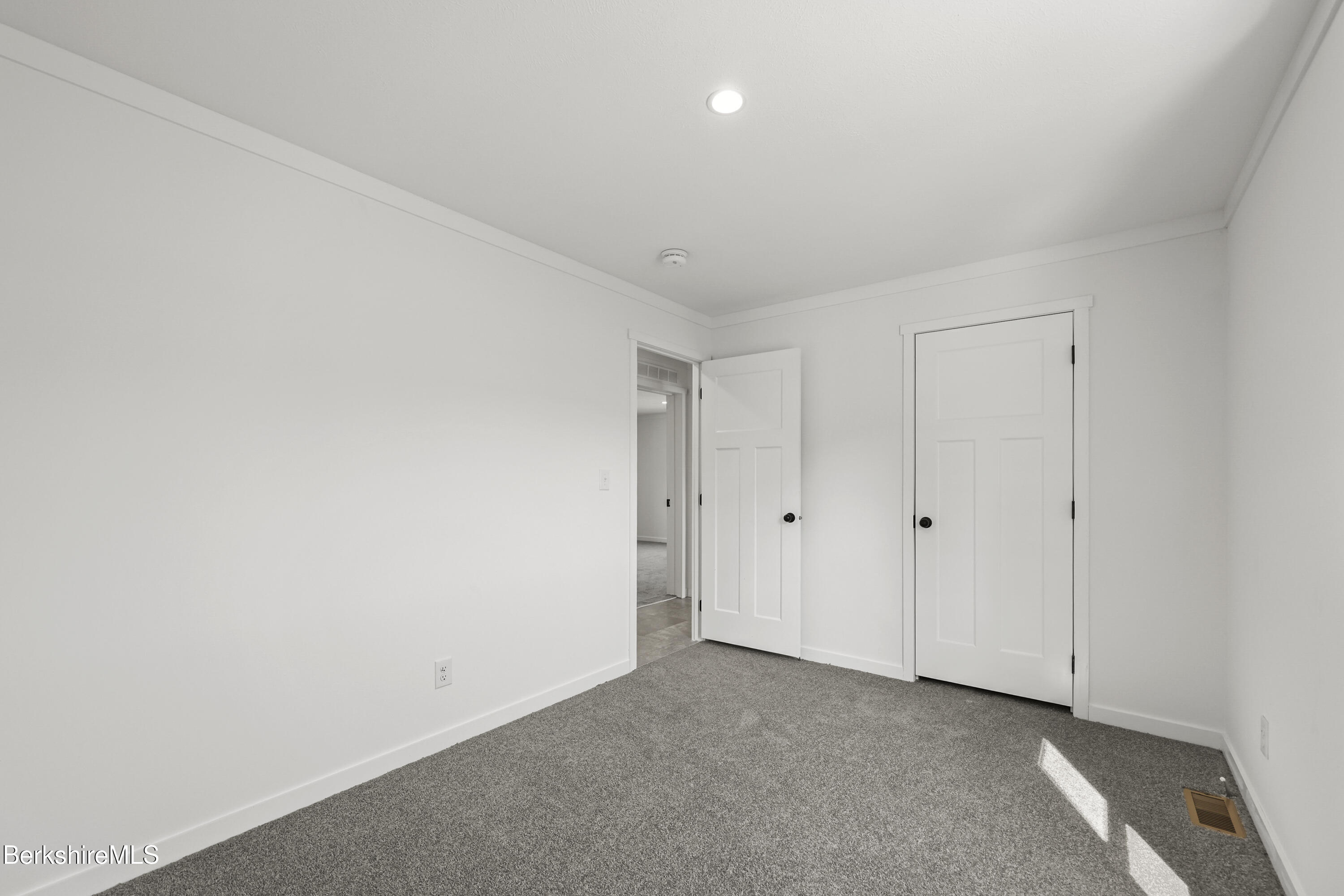 395 Cheshire Road, Unit 102 Pittsfield, MA 01201 - Photo 25 of 28 a view of an empty room