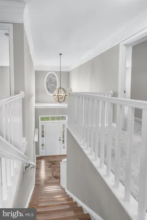 an aerial view of a house with a lake view