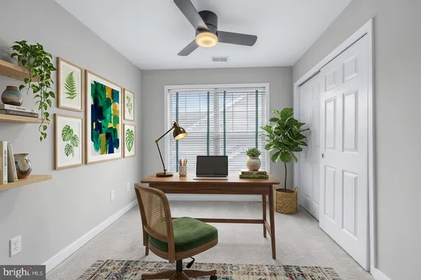 a view of a swimming pool with a yard and a fountain