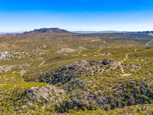 a view of an ocean from a yard