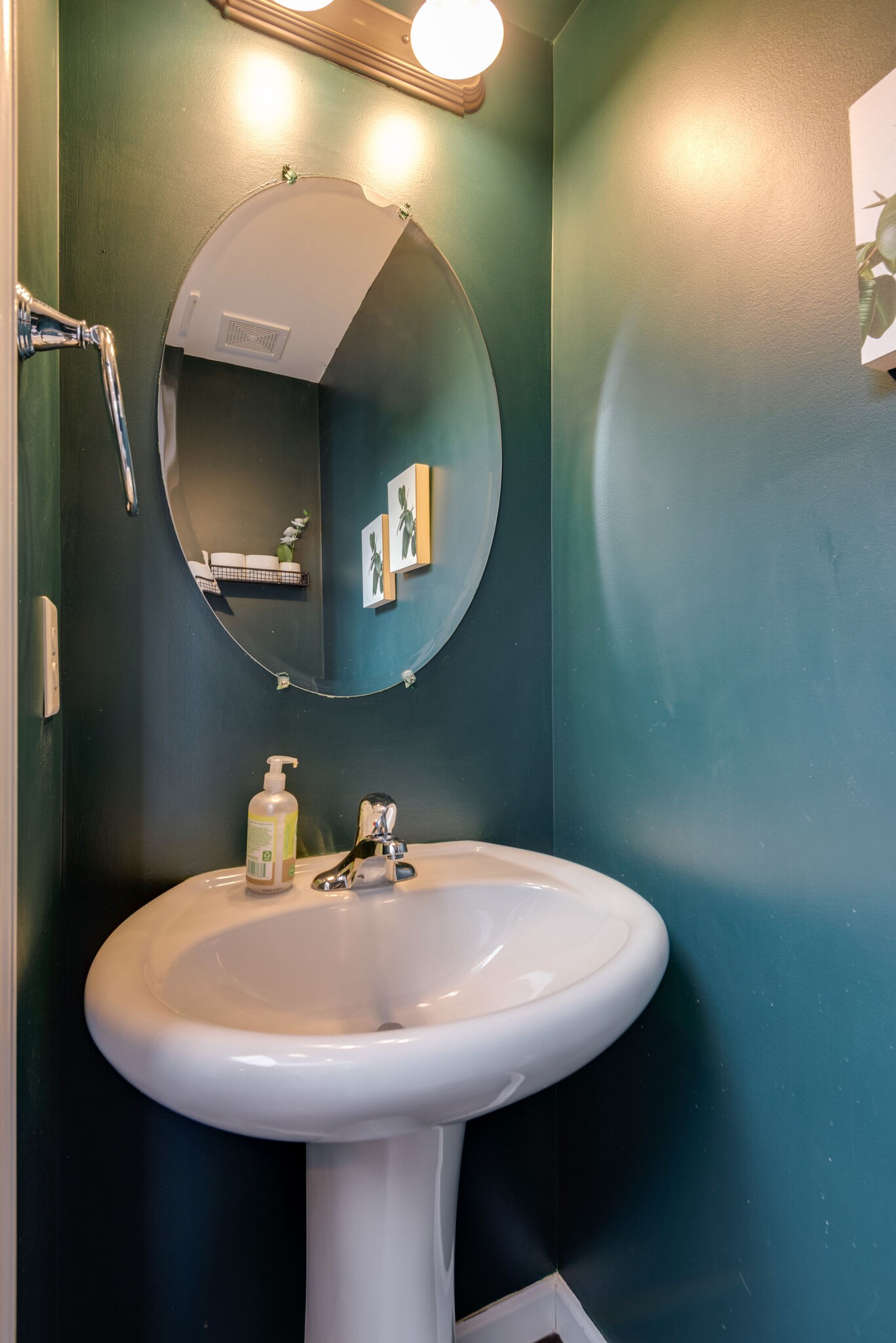 1050 Countess Lane Spring Hill, TN 37174 - Photo 12 of 22 a bathroom with a sink and a mirror