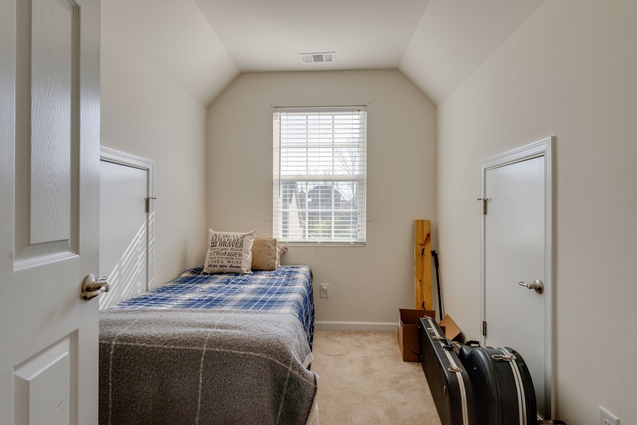 1050 Countess Lane Spring Hill, TN 37174 - Photo 18 of 22 a bedroom with a bed and a window