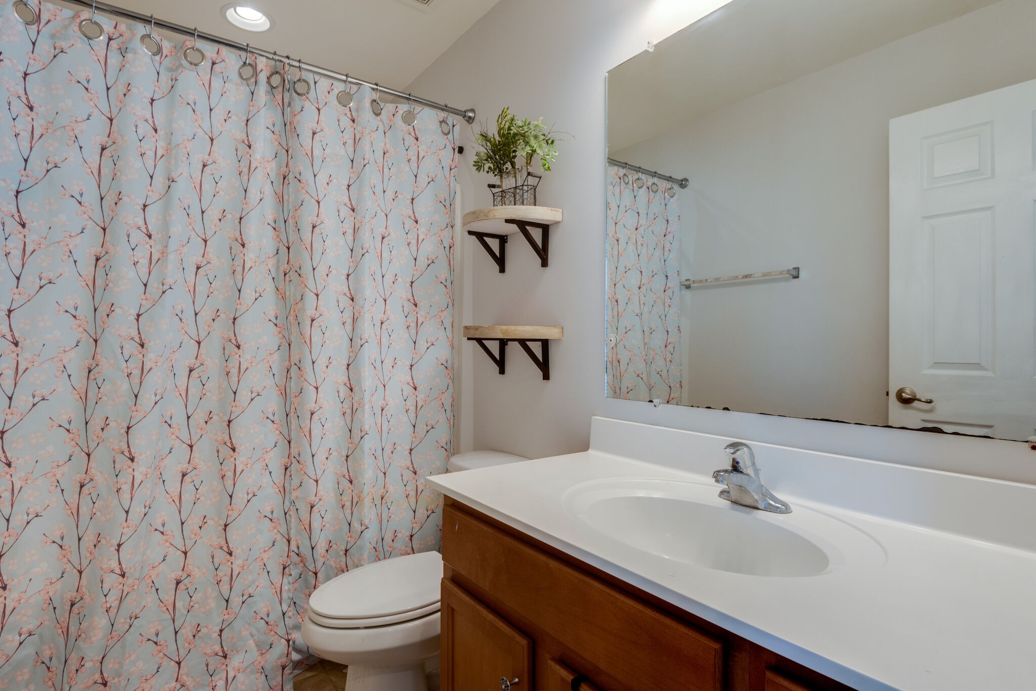 1050 Countess Lane Spring Hill, TN 37174 - Photo 19 of 22 a bathroom with a sink toilet and shower