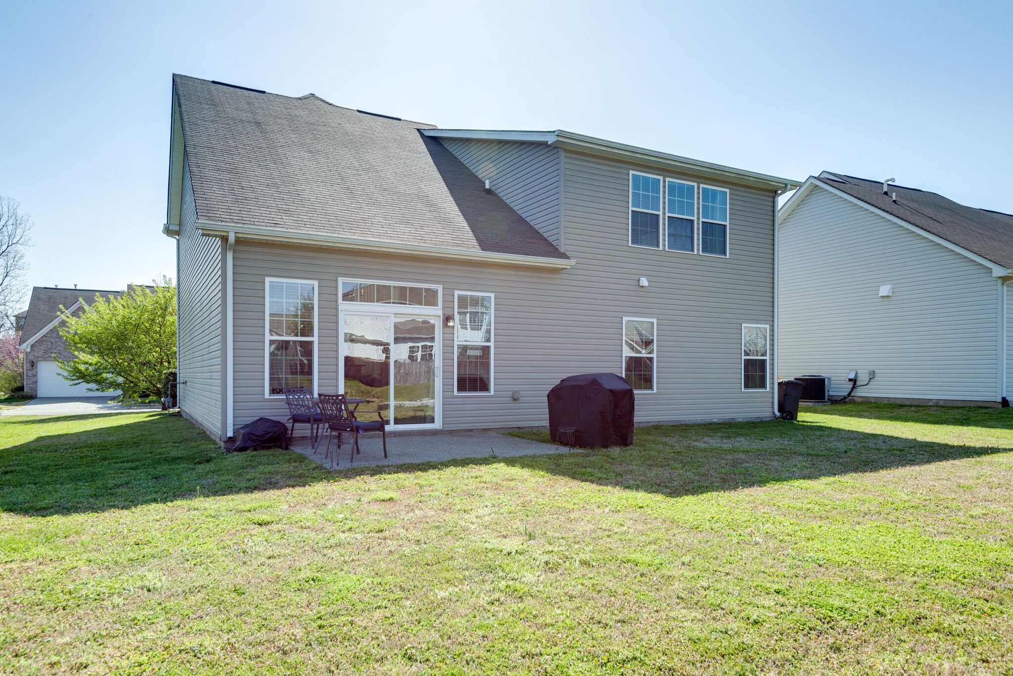 1050 Countess Lane Spring Hill, TN 37174 - Photo 22 of 22 a view of a house with a yard and sitting area