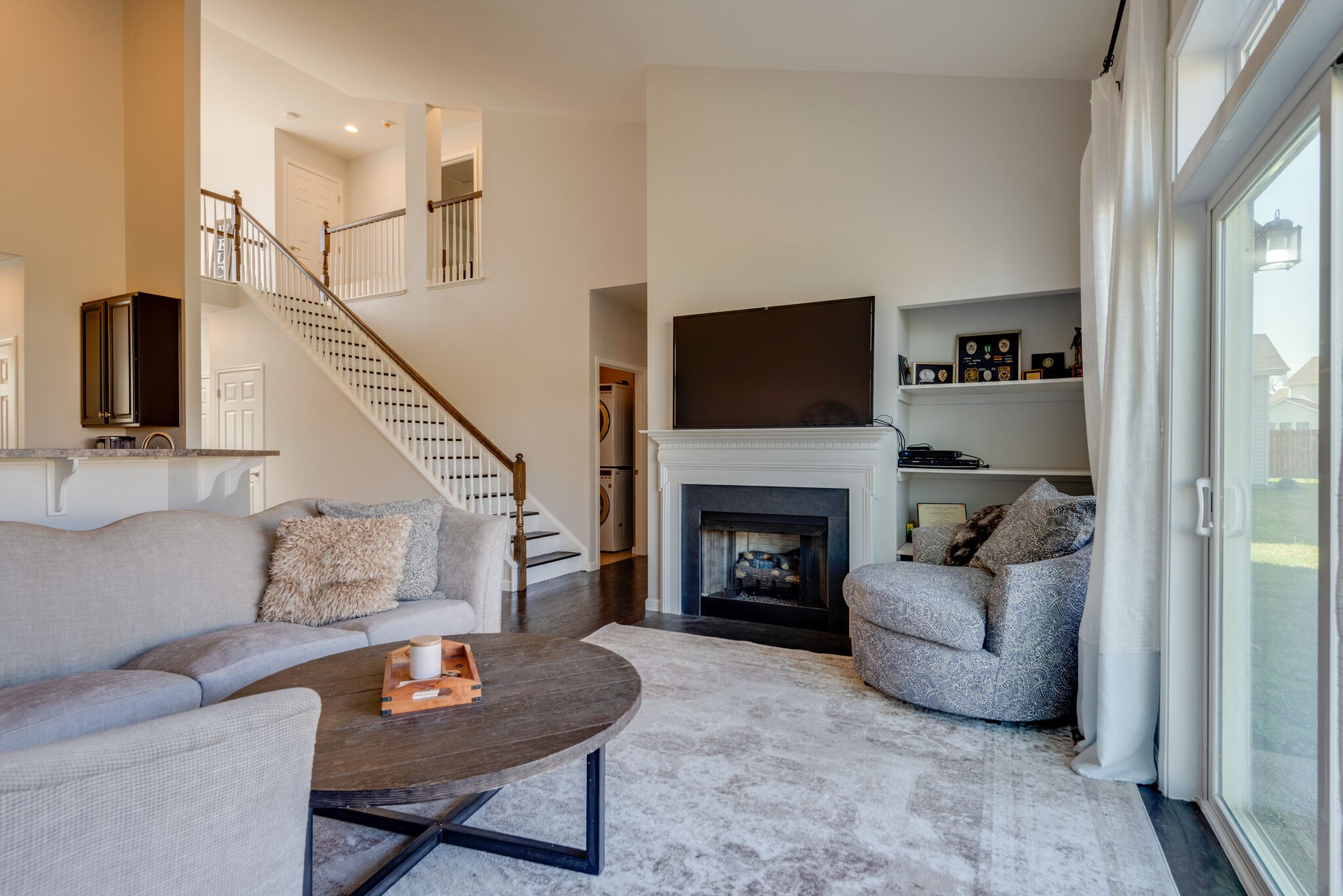 1050 Countess Lane Spring Hill, TN 37174 - Photo 7 of 22 a living room with furniture and a fireplace