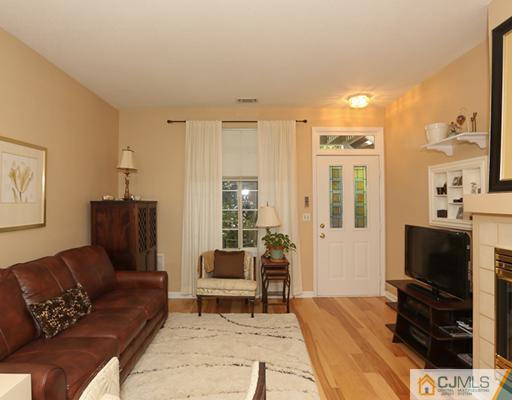 85 Wentworth Road Bedminster, NJ 07921 - Photo 4 of 20 a living room with furniture and a flat screen tv