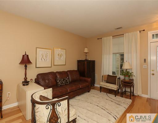 85 Wentworth Road Bedminster, NJ 07921 - Photo 6 of 20 a living room with furniture and a wooden floor