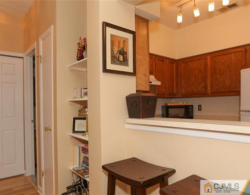 85 Wentworth Road Bedminster, NJ 07921 - Photo 9 of 20 a view of a storage and utility room with a small refrigerator