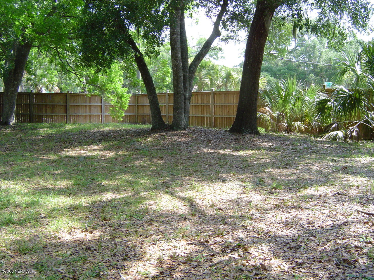 1101 Neck Road Ponte Vedra Beach, FL 32082 - Photo 1 of 1 a view of a yard with a tree