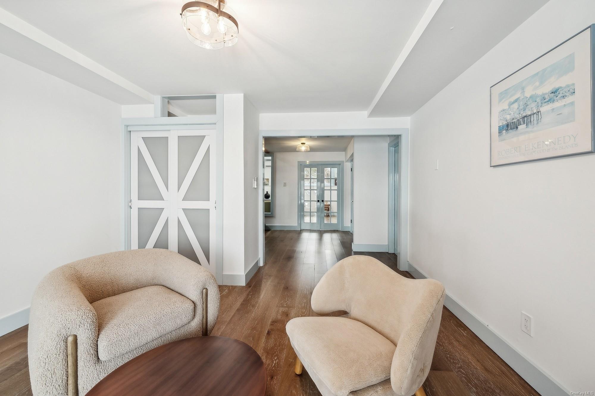 8 Big Reed Path Montauk, NY 11954 - Photo 16 of 39 a living room with furniture and a window