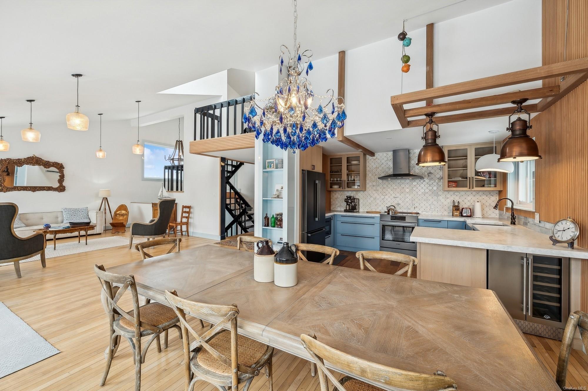 8 Big Reed Path Montauk, NY 11954 - Photo 21 of 39 a living room with lots of furniture and kitchen view