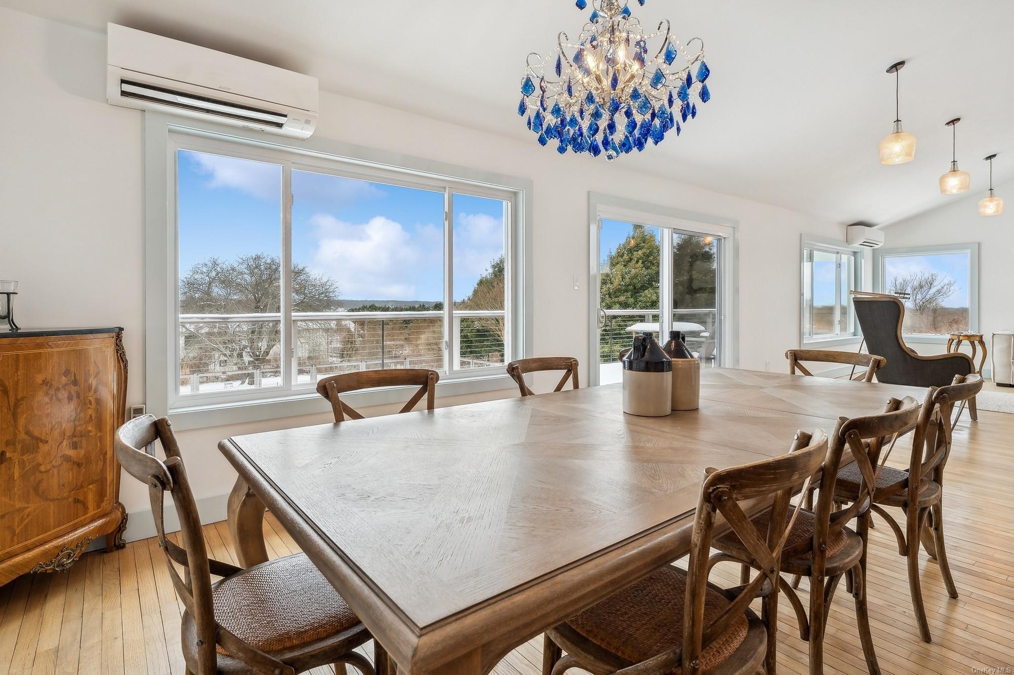 8 Big Reed Path Montauk, NY 11954 - Photo 23 of 39 a view of a dining room with furniture window and outside view