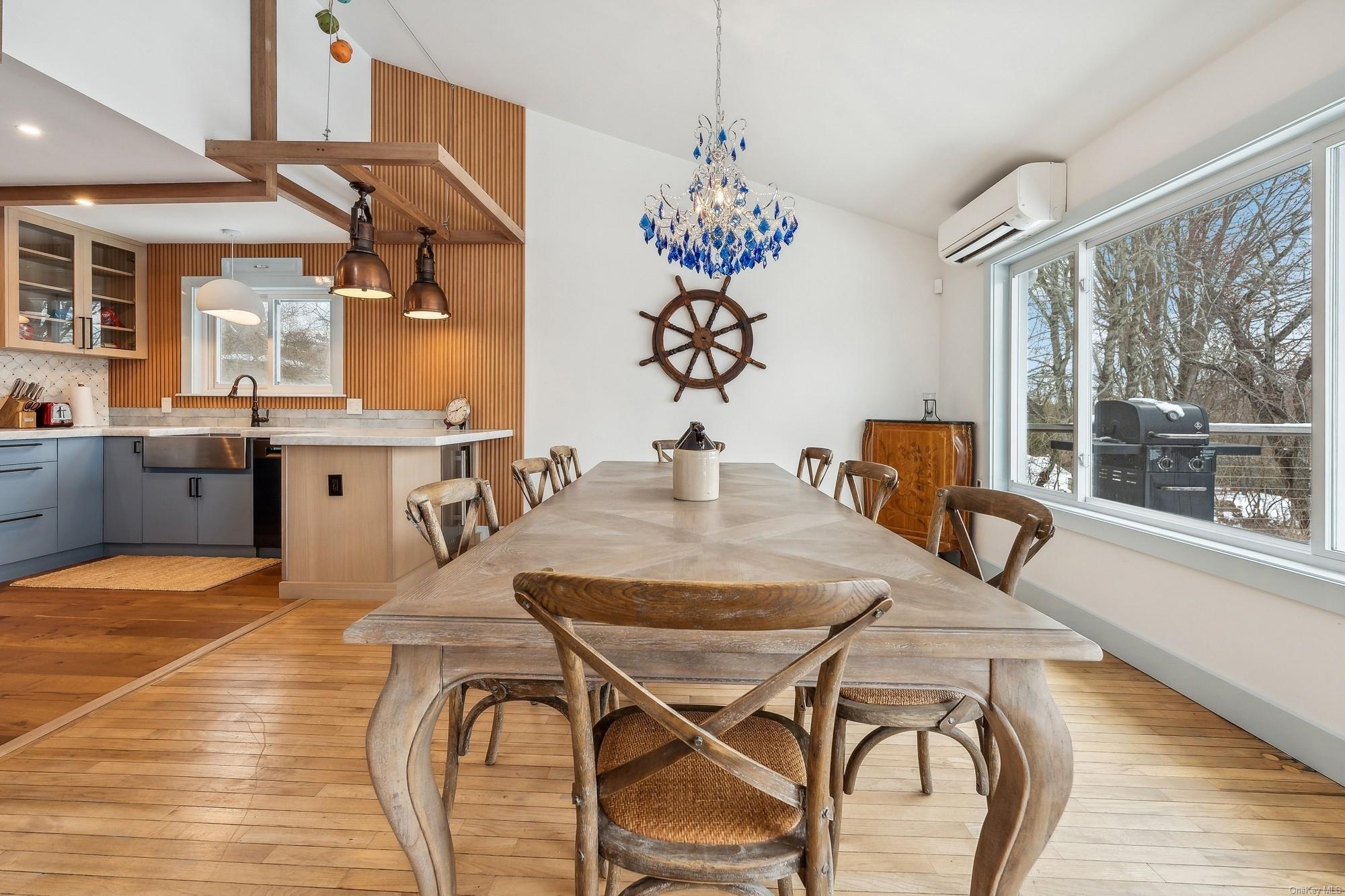 8 Big Reed Path Montauk, NY 11954 - Photo 27 of 39 a view of a dining room with furniture window and outside view
