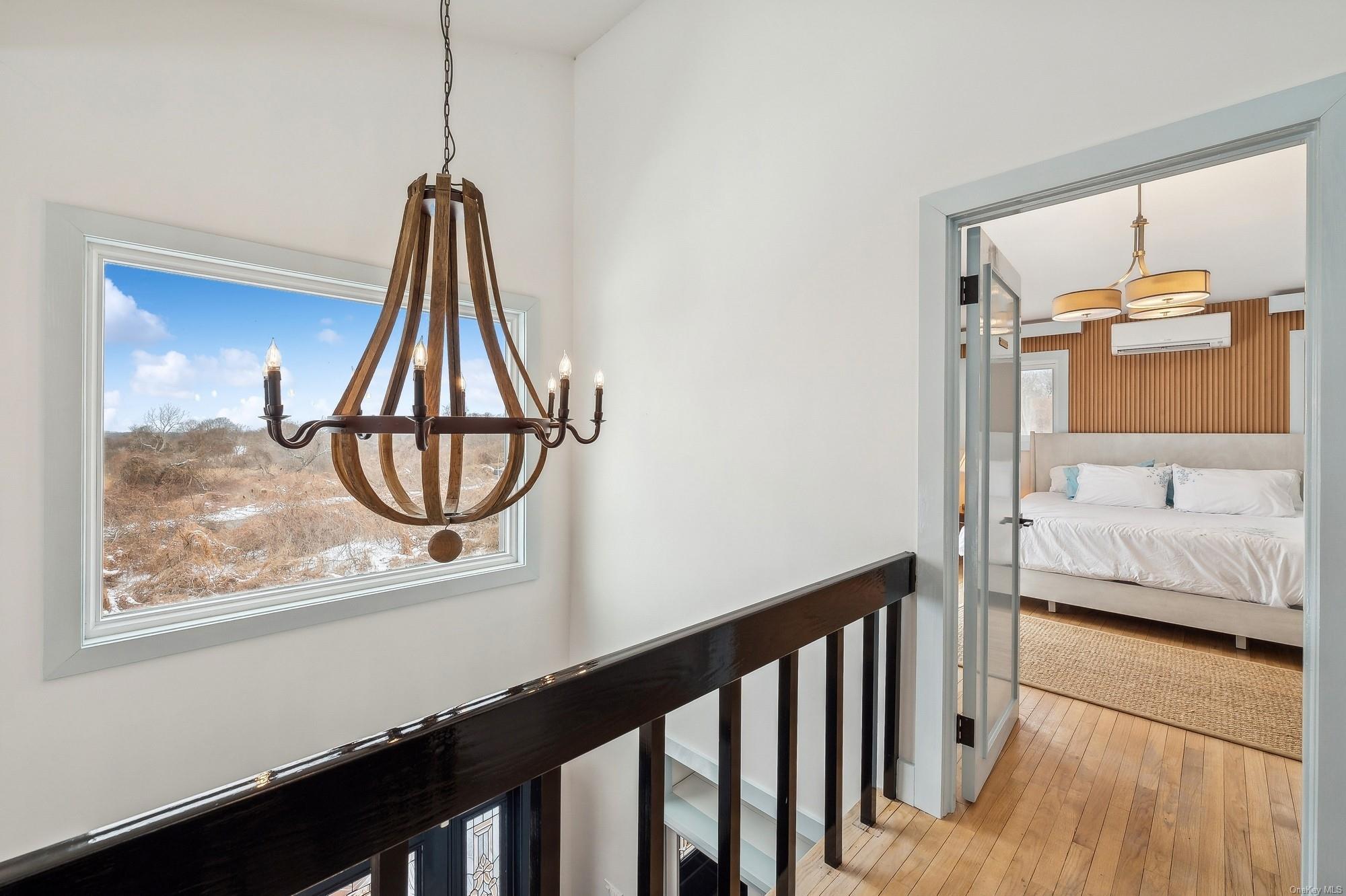 8 Big Reed Path Montauk, NY 11954 - Photo 36 of 39 a bedroom with a bed and a window