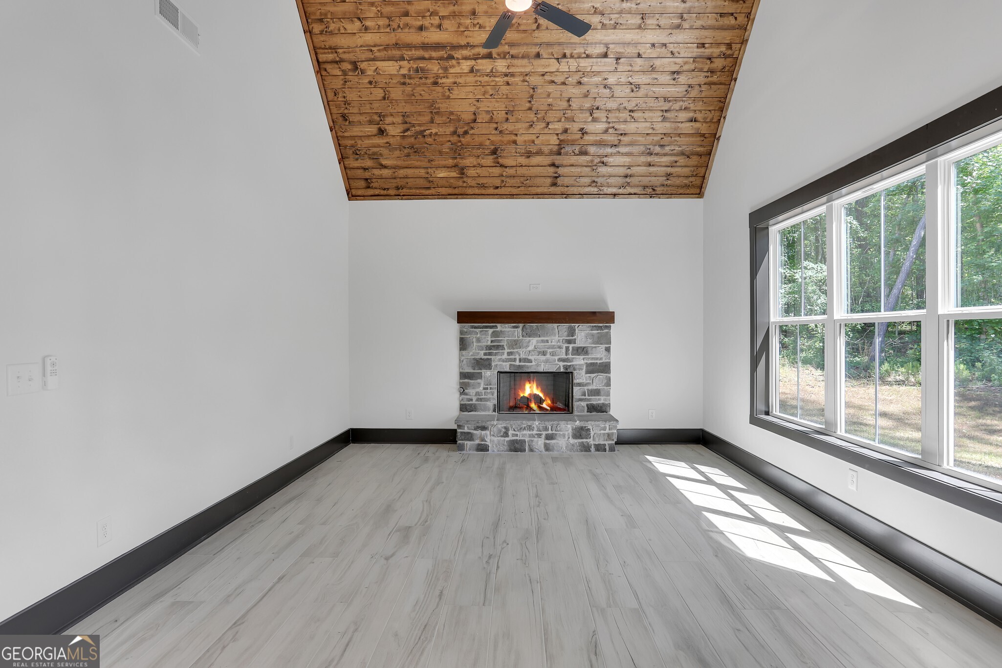 2043 Fischer Road Sharpsburg, GA 30277 - Photo 34 of 52 Keeping room with beautiful stained wood ceiling