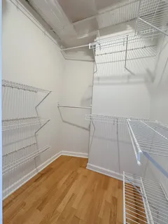 a view of a room with racks on the wall