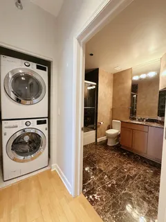 a view of a bedroom and a sink