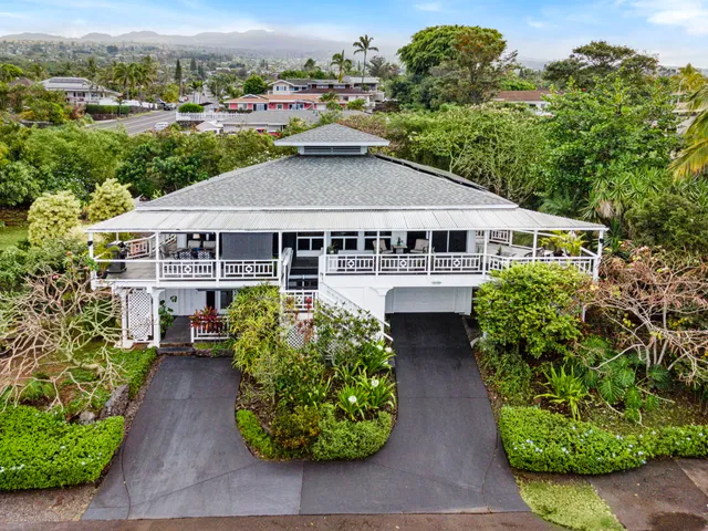 an aerial view of a house with garden