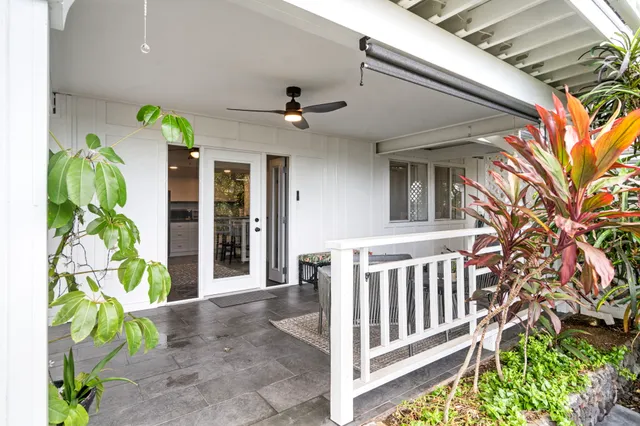 a view of entryway with flower pots
