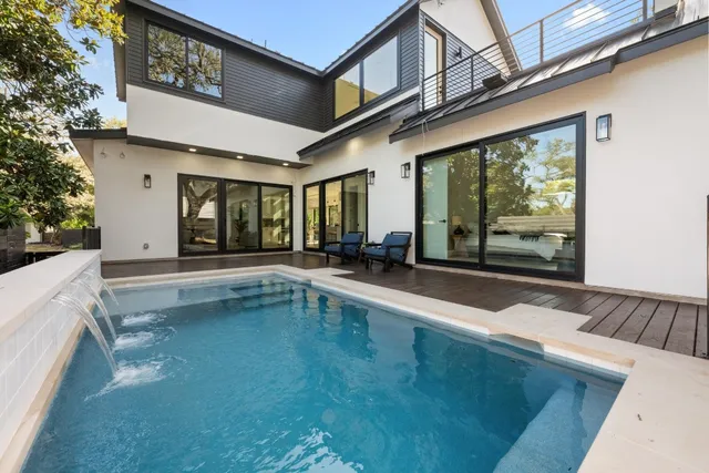 a view of a house with a swimming pool