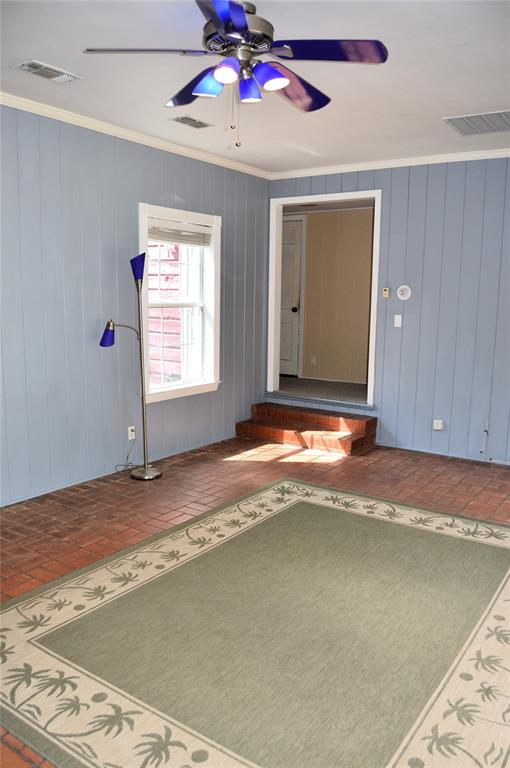4120 Interstate 30 Campbell, TX 75422 - Photo 12 of 36 a view of a livingroom with a ceiling fan and window